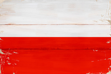 Flaga Polski namalowana na desce