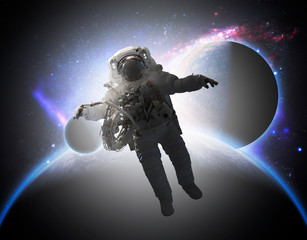 astronaut walking in outer space, elements of this image furnished by nasa b