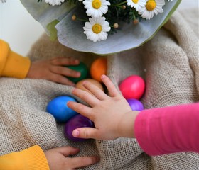 Easter eggs in the hands of children
