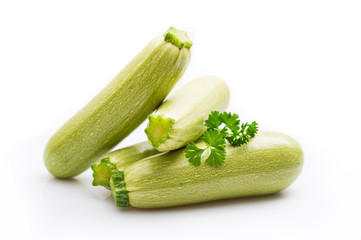 Fresh organic zucchini on the white background