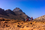 Tourists descend from the mountains to the beach of Balos in Crete, Greece
