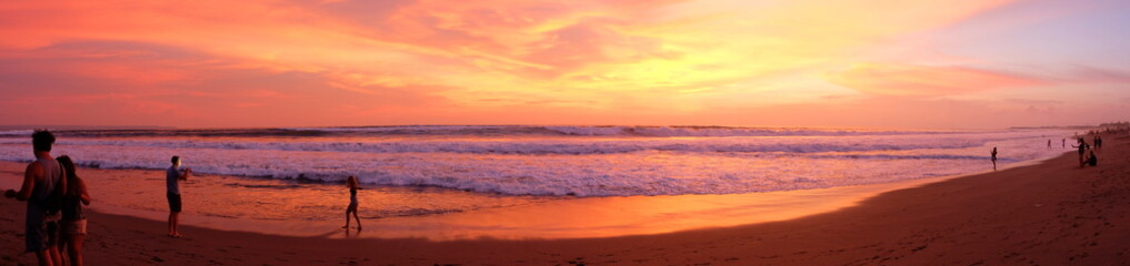 A panorama of the beautiful sunset at one of the beaches of Canggu, Bali, Indonesia