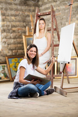 Young female artist and model posing