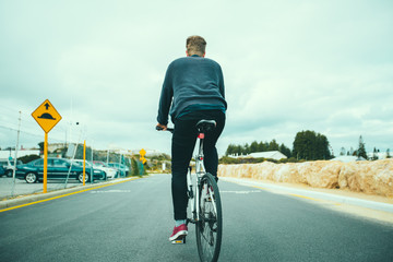 young man on a bike australia