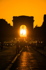 Parishenge, famous event with a stunning sunset under the Arc de Triomphe