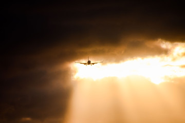 Silhouette airplane flying