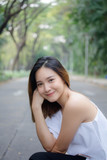 Portrait of thai adult beautiful girl relax and smile
