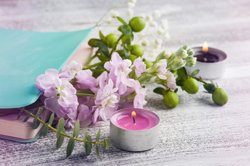 spa setting with candle and flowers