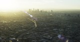 Sunset over Los Angeles skyline, wide aerial