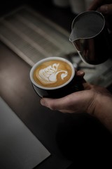 Swan design in coffee