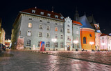 Old buildings in the historic district of Krakow at night