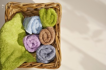 double colored terry towels folded woven square basket