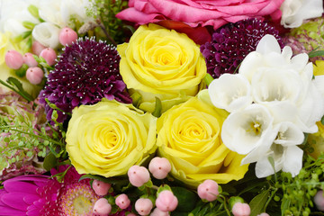 bouquet with roses and many colorful flowers