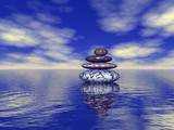 stack of balanced stones on the sea