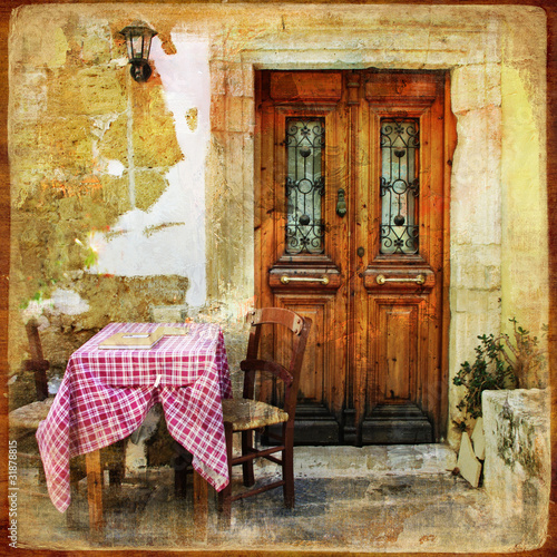 Fototapeta old greek streets with small tavernas