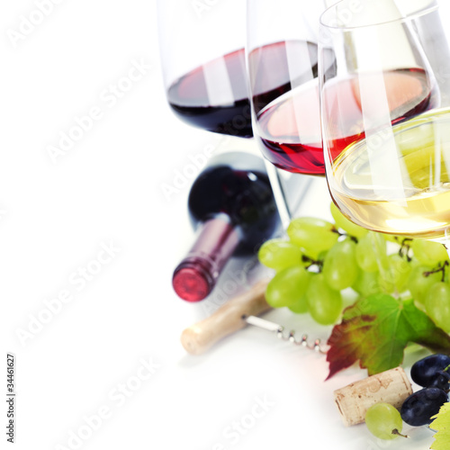 Fototapeta Glasses of white, red and rose wine and grapes