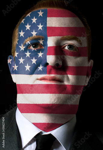 Poster Face of serious businessman or politician painted in colors of u