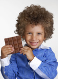 IMAGEN NINO COMIENDO GOLOSINA imagen nino comiendo golosina: