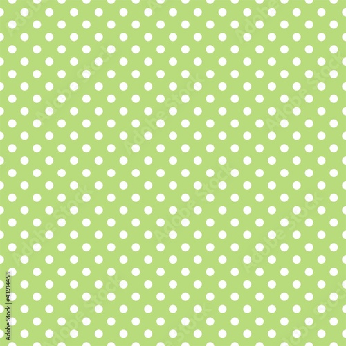 Fototapeta Seamless vector pattern with polka dots on green background