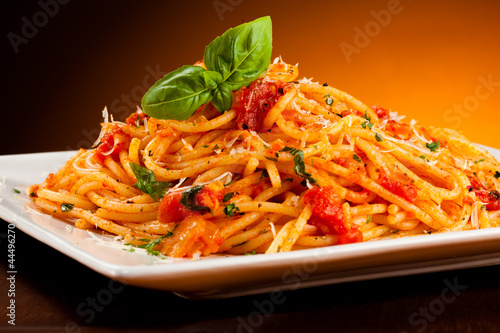 Fototapeta Pasta with tomato sauce and parmesan