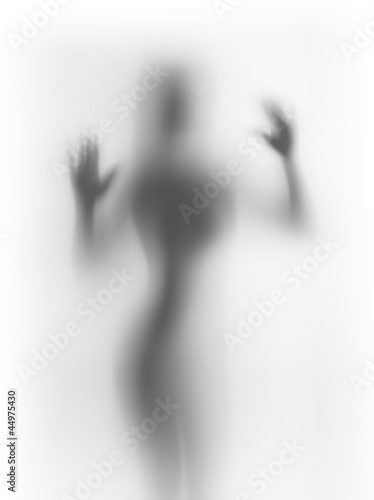 Fototapeta Diffuse woman body silhouette, behind a curtain