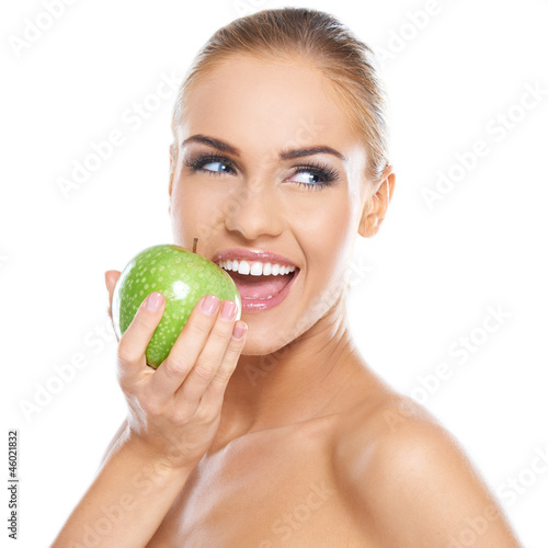 Fototapeta Smiling beauty holding green apple