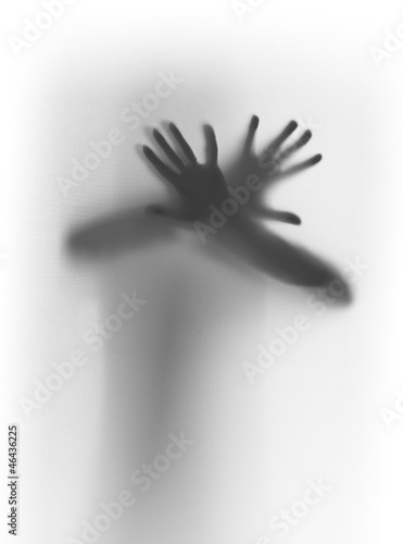 Fototapeta Hands, fingers behind a diffuse glass surface