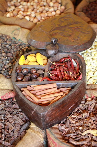 Fototapeta Traditional spices and dry fruits in local bazaar in India.