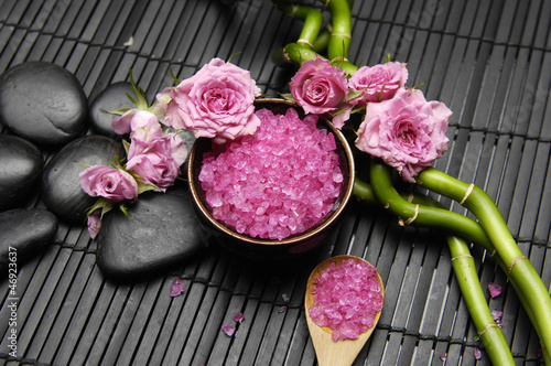  Spa sitting with rose and salt in bowl with spoon on mat