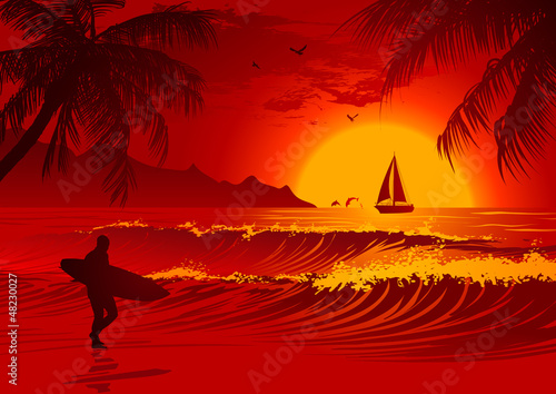 Fototapeta Silhouette of the man with a surfboard at sunset