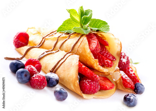 Fototapeta Crepes With Berries. Crepe with Strawberry, Raspberry, Blueberry