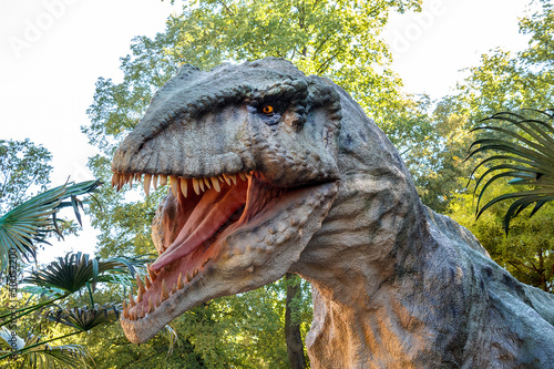 Fototapeta model of big tyranosaurus rex jungle