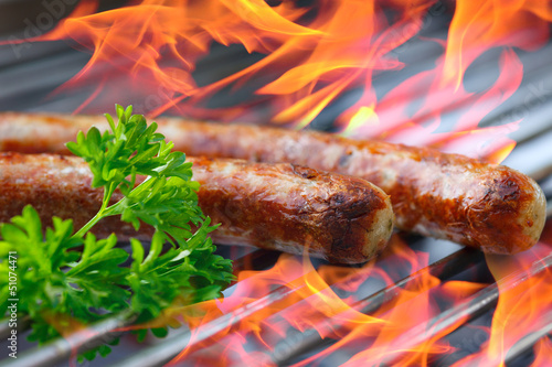 Fototapeta sausages on grill
