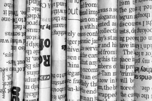 Lacobel Row of Newspapers in black and white