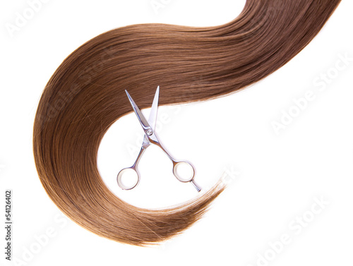 Fototapeta hairdressers scissors and lock of hair