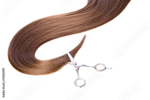  hairdressers scissors and lock of hair