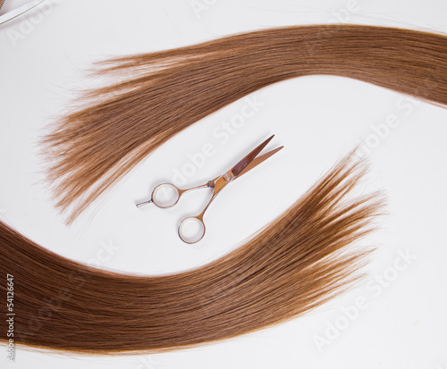 Fototapeta hairdressers scissors and lock of hair