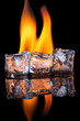 Ice cubes with flame on shiny black surface