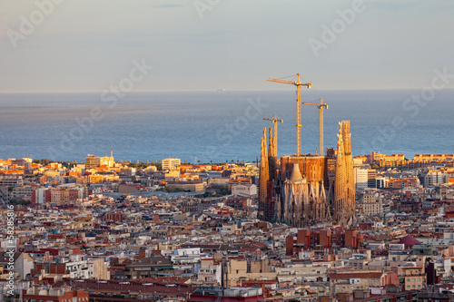 Fototapeta View of Barcelona from park Guel on a sunset