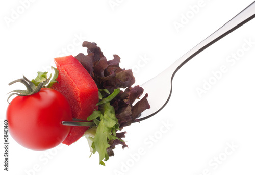  Fresh salad and cherry tomato on fork isolated on white backgrou