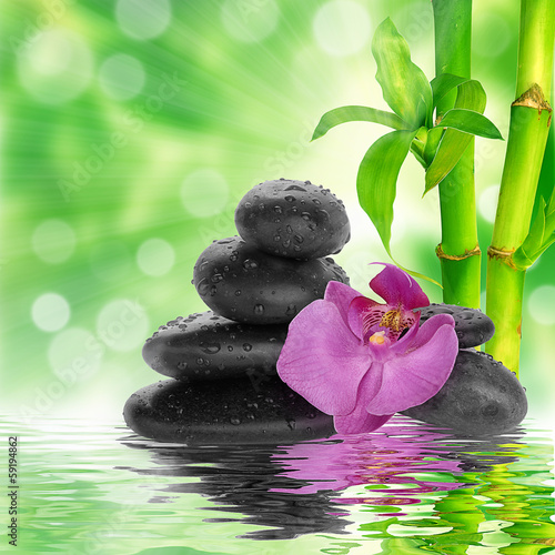  spa Background - black stones and bamboo on water