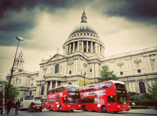 Lacobel St Paul's Cathedral in London, the UK. Red buses, vintage style.