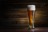 beer glass on a wooden background poster