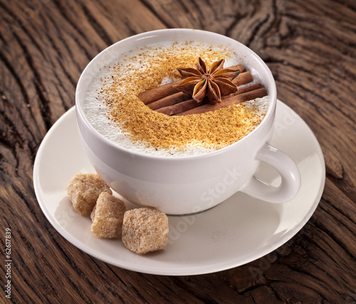  Cup of cappuccino decorated with spices.