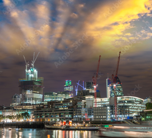  London modern night skyline from across River Thames