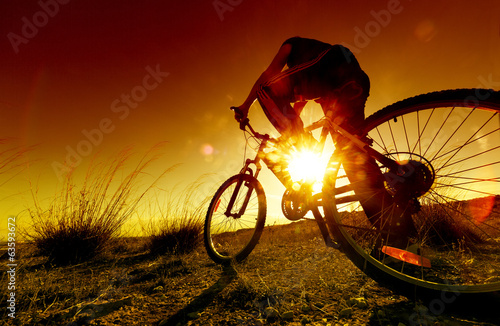  Dreamy sunset and healthy life.Fields and bicycle