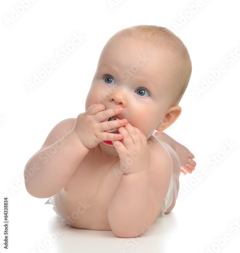 infant child girl lying happy holding baby nipple soother