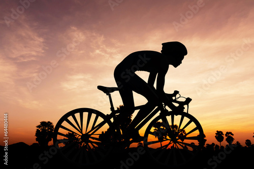 Fototapeta Cycling triathlon on twilight time