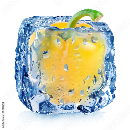 Fototapeta Yellow pepper in ice cube