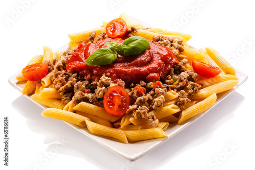 Fototapeta Pasta with meat, tomato sauce, parmesan and vegetables